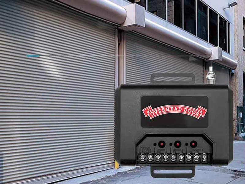 Overhead Door commercial garage door operator mounted in front of a closed rolling door, showcasing reliability and integration for commercial applications.