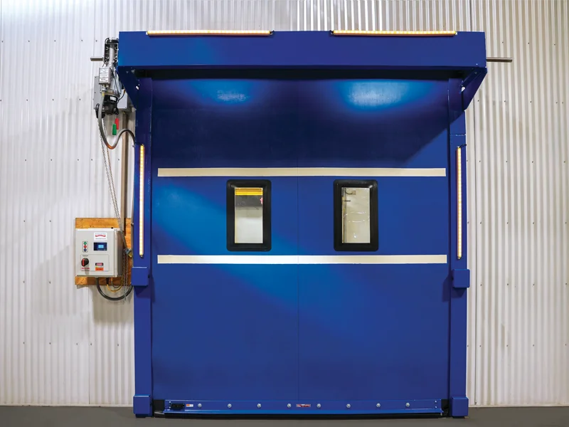 Modern blue commercial garage door with windows, advanced operator controls, and safety features, emphasizing customization and performance for businesses.