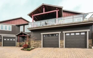 Insulated steel garage doors from the Thermacore® Collection, featuring a modern design and premium construction, enhancing thermal efficiency and aesthetic appeal for residential properties.