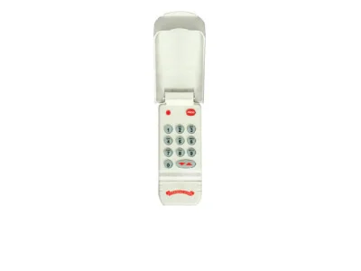 Keypad Model OWK-BX with a flip cover, featuring numeric buttons and a PROGRAM key, designed for garage door control.